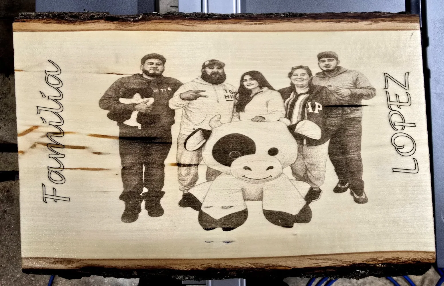 Familia Lopez wooden family engraving